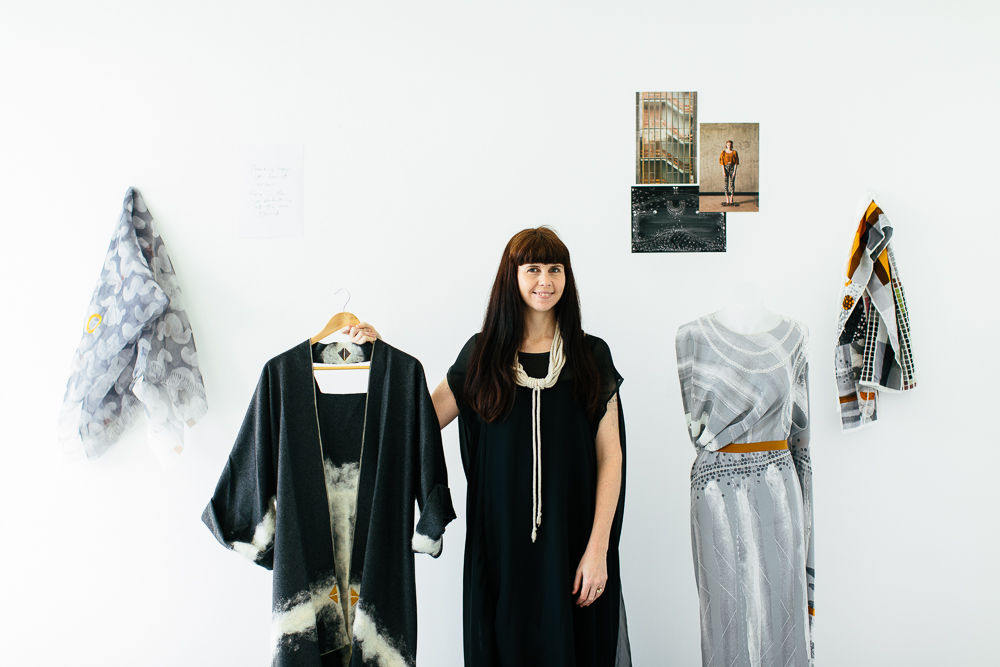 Holly Mcquillan poses with some of her zero waste garments. Image courtesy: PIVOT.