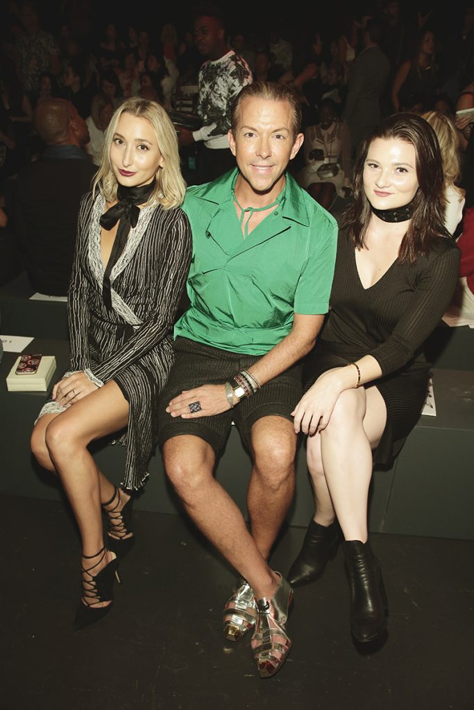 In the middle is Derek Warburton, the Co-Owner and creative director of LAPALME Magazine and former TV personality, pictured with his close friends. Image Source: Getty Images
