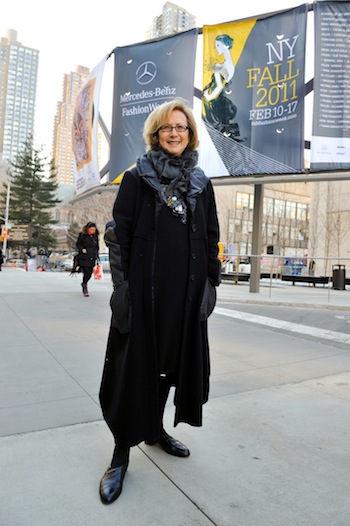Gladys Perint Palmer Strikes a Pose with Her Illustrations at Mercedes-Benz Fashion Week at Lincoln Center