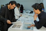 Yigal Azrouel with fashion and knitwear design student Peter Nguyen
